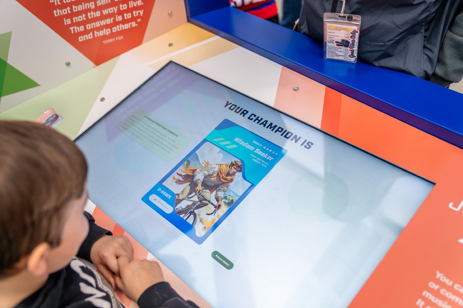 Child playing My Champion exhibit